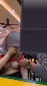 Hijabi Girl Boobs Pressing By BF In Public Restaurant