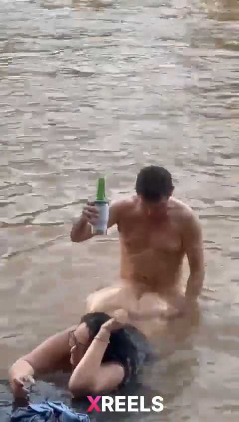 Uncle Drinking Beer And Fucking MILF In The River While Friends Watching