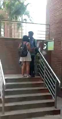Collage Couple Caught Kissing in a public area